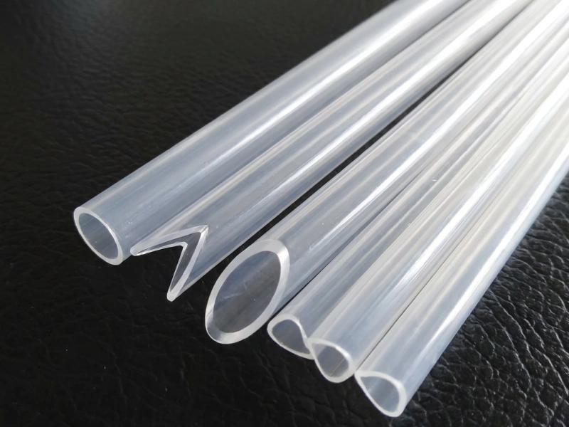 Dip tube samples showing flat square V-notch slanted and concave cut-end profiles formed in-line by the extrusion line