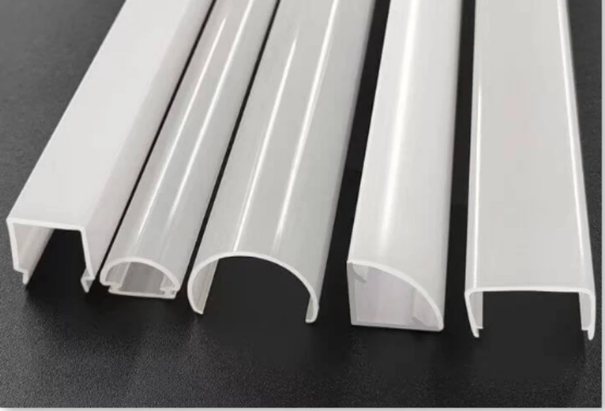 PC and PMMA diffuser profile samples used to review optical surface quality from a PC profile extrusion line