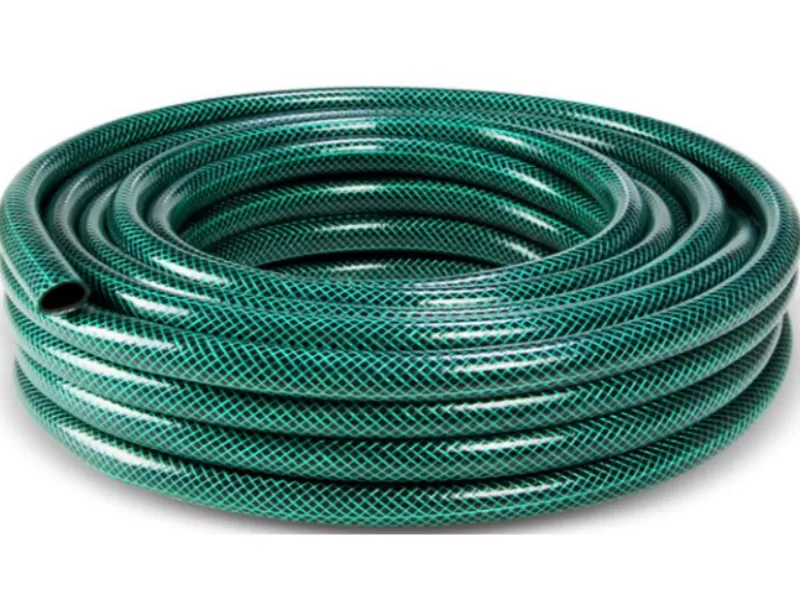 Green PVC garden hose sample showing garden hose output from a PVC braided hose extrusion line