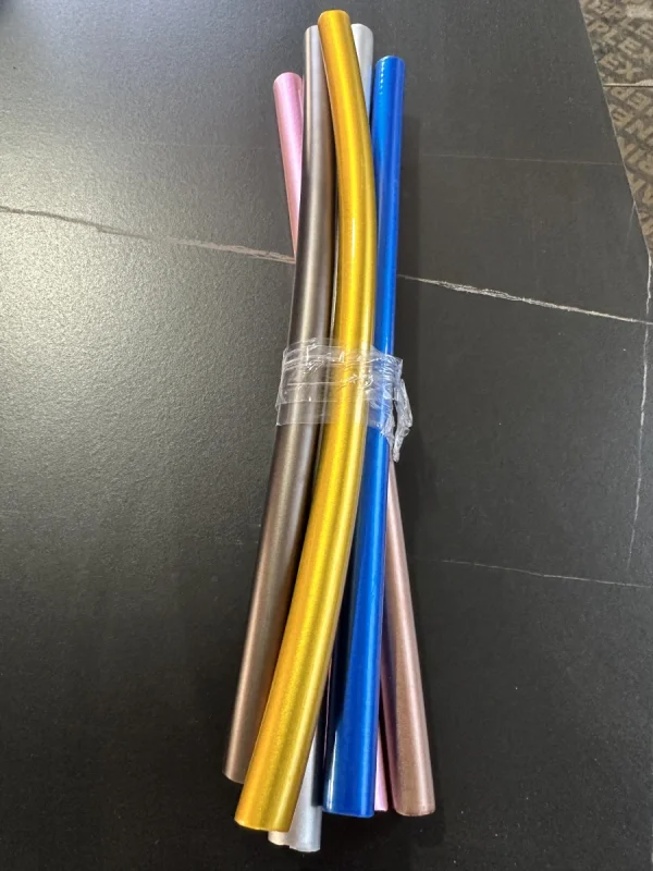 Multi-color smooth PVC shower hose sample showing decorative bathroom hose output from a shower hose extrusion line