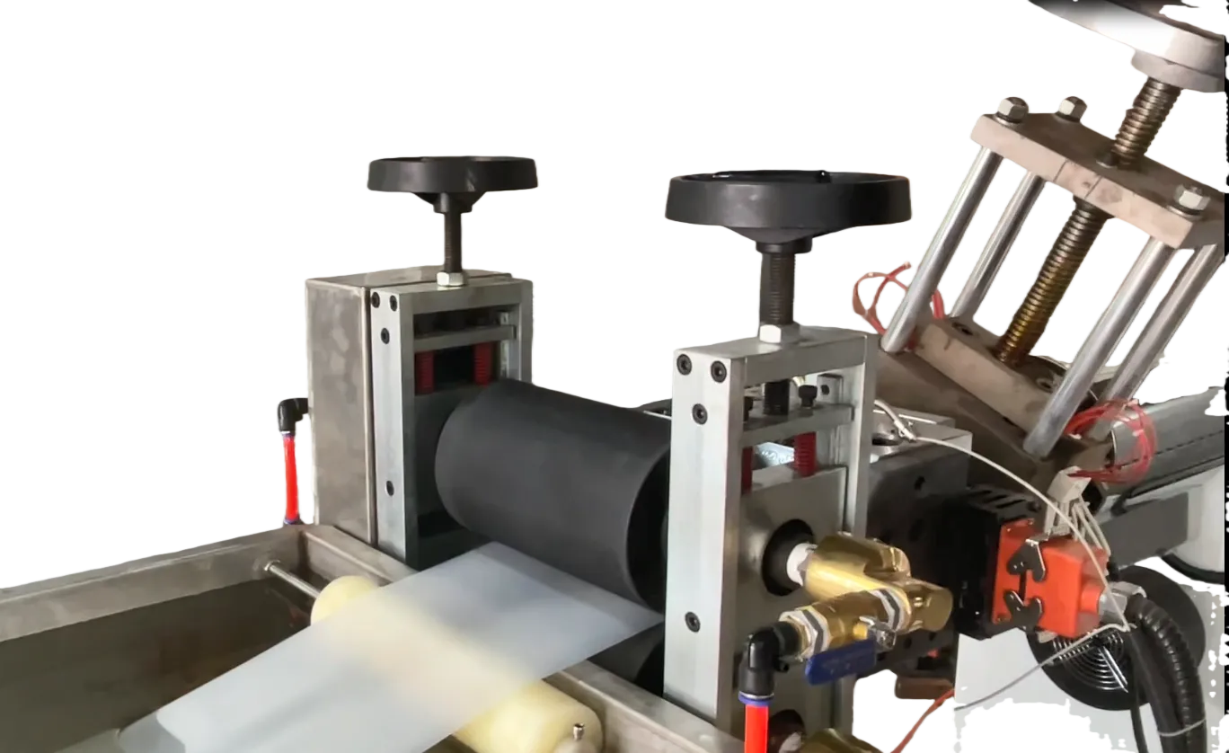 Roll calender section forming flat TPE band during factory testing of a TPE tourniquet extrusion line