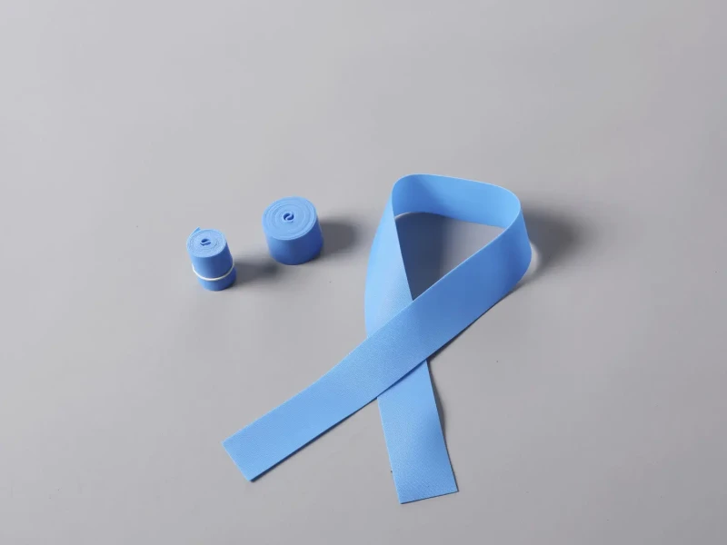 Blue TPE tourniquet samples from a TPE tourniquet extrusion line for medical band production