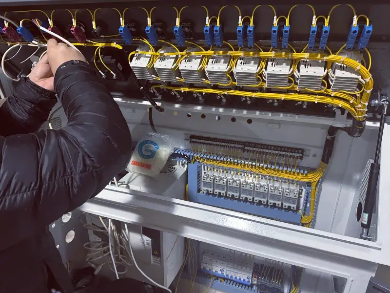 Jason wiring a Jinxin extrusion line before shipment