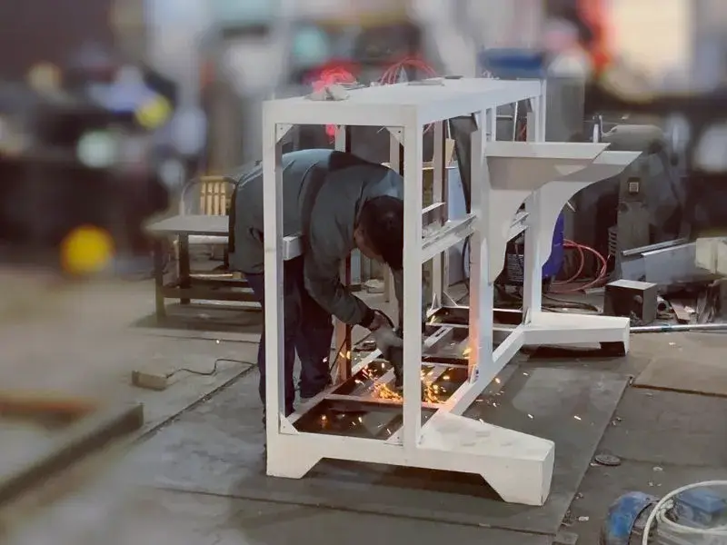 Welded machine frame being fabricated inside Jinxin factory